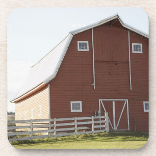 Barn in rural landscape coaster