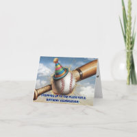 baseball wearing birthday hat in front of bat