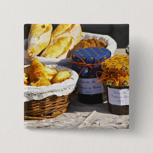 Basket with croissants and chocolate breads. 15 cm square badge (Front)