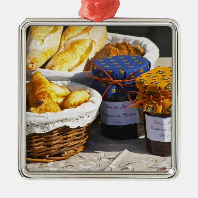 Basket with croissants and chocolate breads. metal ornament (Front)
