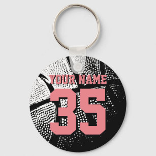 Basketball key chain with coral pink jersey number