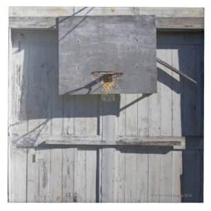 Basketball net on rustic building ceramic tile
