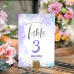 Bat Mitzvah Purple Watercolor Silver Glitter Girly Table Number<br><div class="desc">No Bat Mitzvah party is complete without personalised table number cards. Let your favourite Bat Mitzvah be proud, rejoice and celebrate her milestone at her perfectly coordinated party. Stunning, modern, sparkly silver faux foil handwritten script and tiny dots overlay a light purple watercolor background. Personalise the custom text with the...</div>