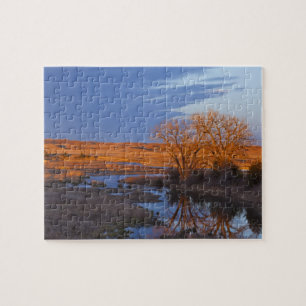 Bathed in sunset light the Calamus River Jigsaw Puzzle