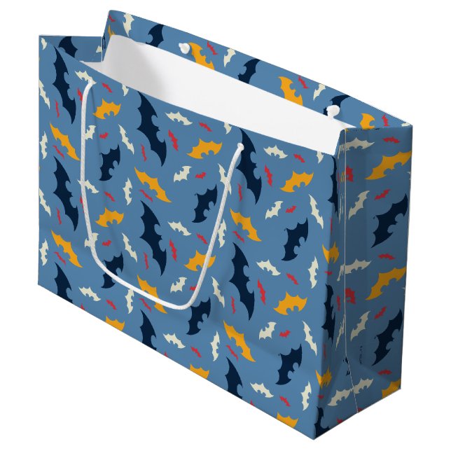Batman | Red, Blue, and Yellow Bat Logo Pattern Large Gift Bag (Front Angled)
