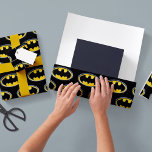 Batman Symbol | Classic Logo Wrapping Paper<br><div class="desc">Featuring the symbol of the world's most famous superhero, this classic comic book inspired design has been brought to you by DC Comics. With Batman's famous yellow bat logo set against a bold, black background, this classic design will add a fun element to your birthday gift. Perfect for kids, lovers...</div>