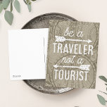 Be a Traveller Not a Tourist Map Typography Quote Postcard<br><div class="desc">Be a traveller,  not a tourist. Share your love of travel with our global chic postcard featuring the quote in white monoline typography with two arrow illustrations. Background is a sepia tone vintage 1708 world map.</div>