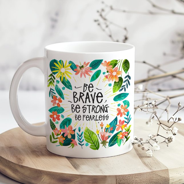 "Be Brave Be Strong" Colourful Flowers and Leaves Coffee Mug ("Be Brave Be Strong" Colorful Flowers and Leaves Coffee Mug on a boho kitchen table with dry flowers)