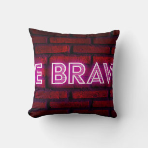Be brave inspirational quote neon effect text on o cushion