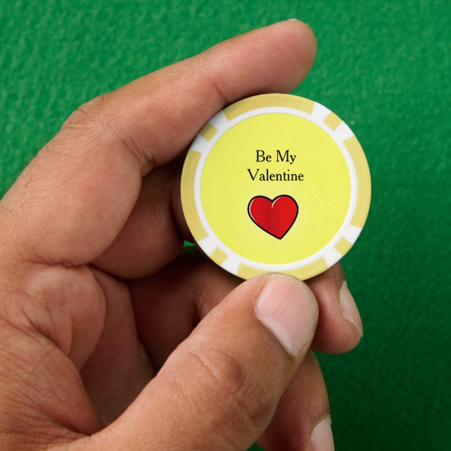Be my valentine red heart on yellow poker chips (Hand)