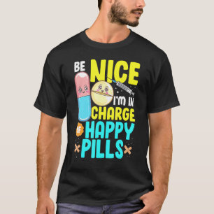 Be Nice Im In Charge Of Happy Pills Nursing Tee Nu