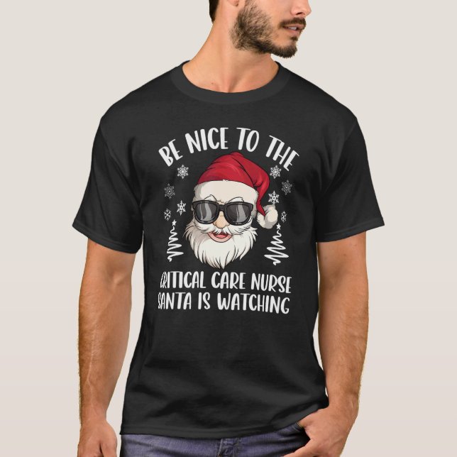 Be Nice To The Critical Care Nurse Santa Is Watchi T-Shirt (Front)