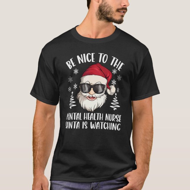 Be Nice To The Mental Health Nurse Santa Is Watchi T-Shirt (Front)