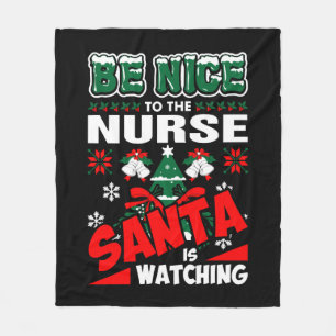 Be Nice To The Nurse Santa Is Watching Fleece Blanket