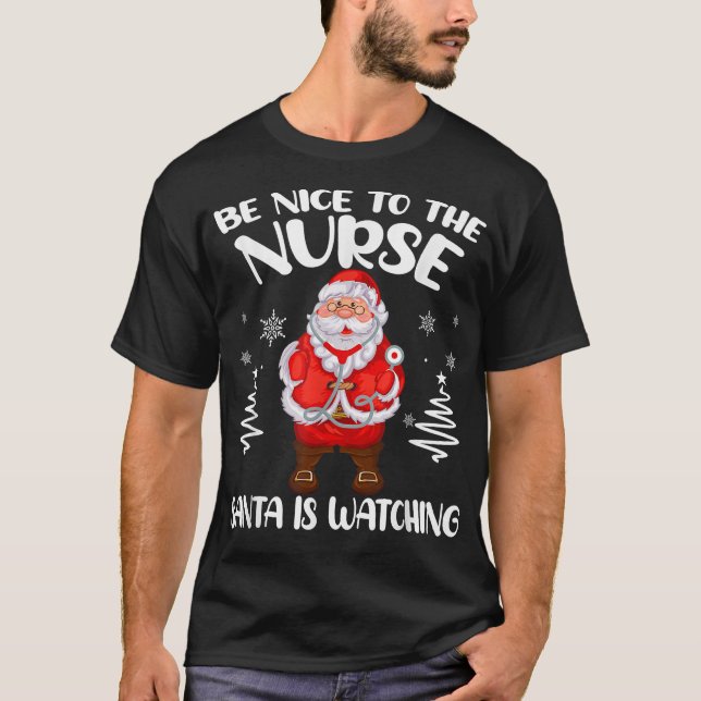 Be Nice To The Nurse Santa Is Watching Nursing Chr T-Shirt (Front)
