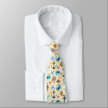 Beach And Sea Life Themed Pattern Tie<br><div class="desc">A nice tie with a summery tropical themed pattern filled with items from the beach created with watercolors. Crabs,  seashells,  starfish and anchors. Cream and blue colour scheme.</div>