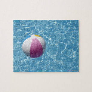 Beach ball in swimming pool jigsaw puzzle
