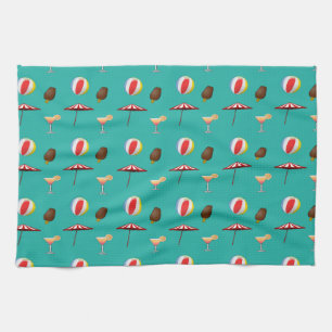Beach balls, ice cream and cocktail on green tea towel