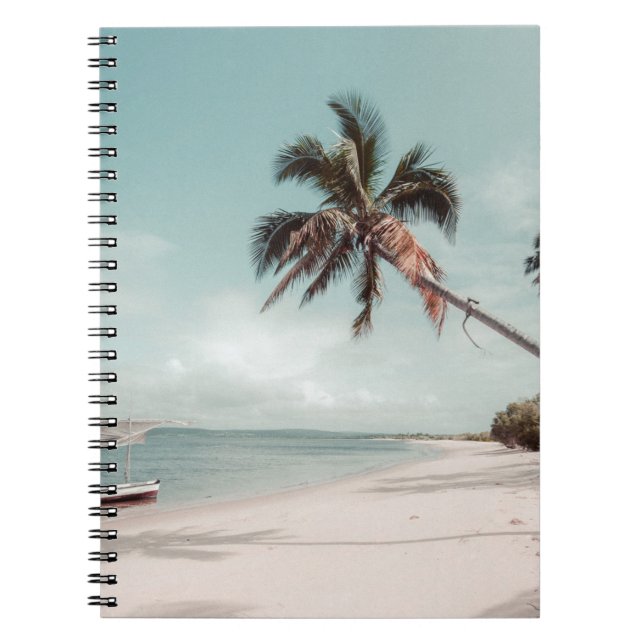 Beach beside coconut palm tree notebook (Front)