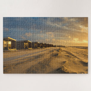 Beach cabins at sunset at the dutch coast jigsaw puzzle