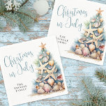 Beach Christmas In July Napkin<br><div class="desc">Celebrate the season with this festive and beachy party napkin, perfect for a Christmas in July gathering. The design features a whimsical Christmas tree made of beach shells, starfish, and coral on the right side, adding a fun coastal touch to your table setup. The overall colour palette includes shades of...</div>