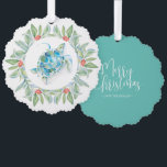 Beach Christmas Sea Turtle Tree Decoration Card<br><div class="desc">This beach Christmas ornament features a watercolor sea turtle encircled by a wreath of greenery and red berries. The ornaments reverses to feature the words "Merry Christmas" in hand lettered typography over a turquoise blue background. Use the template fields to add your custom greeting. A charming choice for gift giving...</div>