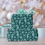 Beach Christmas Seahorse Glitter Teal Aqua Wrapping Paper<br><div class="desc">This coastal Christmas wrapping paper features a pattern of aqua blue glitter seahorses,  seashells,  and holly sprigs on a dark teal background,  for a festive beach holiday design.</div>