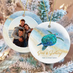 Beach Coastal Sea Turtle Seas and Greetings Photo Ceramic Ornament<br><div class="desc">This Hawaiian tropical coastal themed holiday ornament is easily personalised with family name on the front and a photo on the back, and features a watercolor turquoise blue sea turtle on an abstract beach background with a faux gold glitter sparkly wave, and gold Seas & Greetings. Check out the collection...</div>