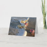 Beach Merry Christmas Holiday Card<br><div class="desc">This beautiful card features a message of "Merry Christmas" and a beautiful scene with holiday ornaments,  surf,  and sand.</div>