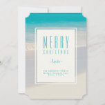 Beach "Merry Christmas" Personalised Holiday Card<br><div class="desc">This Christmas holiday tropical beach design can be personalised with your salutation, family name (surname), and first names. The text "Merry Christmas" is set in a popular modern text. The turquoise blue typography is place on an off-white label and set on top of a photo of a tropical beach scene...</div>