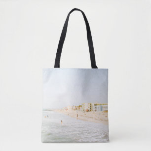 BEACH NEAR BUILDING AT DAYTIME TOTE BAG