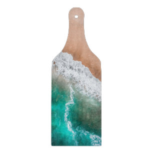 Beach ocean water on seashore sand tropical summer cutting board