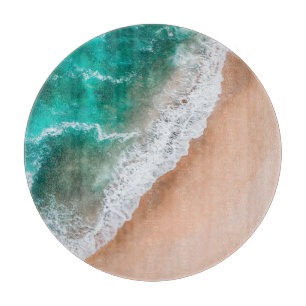 Beach ocean water on seashore sand tropical summer cutting board