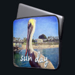 Beach Pier Pelican Bird Photo Sun Day Quote Script Laptop Sleeve<br><div class="desc">This happy pelican perched on a railing overlooking a California beach screams “vacation ready”. Drift back to the warm ocean breezes whenever you use this colourful photography neoprene laptop sleeve. This laptop sleeve comes in three sizes: 15", 13", and 10”. Makes a great gift for someone special! You can easily...</div>