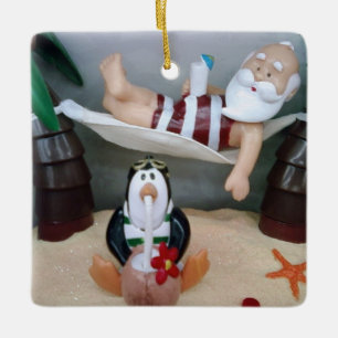 **BEACH SANTA WITH PENGUIN FRIEND** CERAMIC ORNAMENT