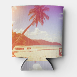 Beach scene, coconut tree, wooden bed. can cooler