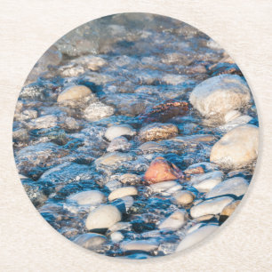 Beach stones on the lake shore round paper coaster