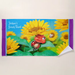 Beach towel sleepy Ladybug sunflowers. Purple edge