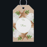 Beach Wreath Sand Dollar Christmas Tie On Gift Tag<br><div class="desc">Sand dollar wreath Christmas gift tags to tie onto presents. Brown sea stars and white sand dollars are combined with green holly to create a wreath border design. A centre white panel holds the “to” and “from” text in hand-written script. Text on the back is “Merry Christmas” or you can...</div>