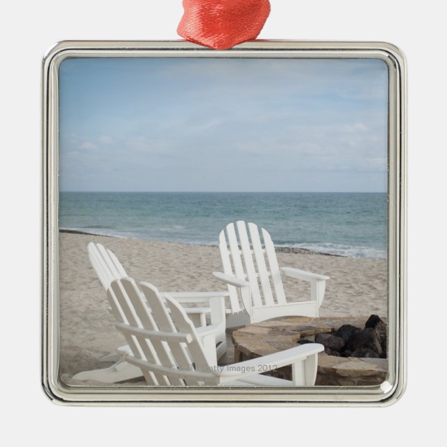 beachfront house with adirondack chairs and metal ornament (Front)