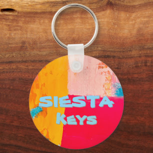 Beachy key chain says “Siesta keys”