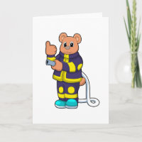 Bear as Firefighter at Fire department with Hose