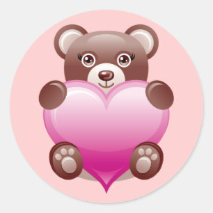 BEAR HOLDING PINK HEART CLASSIC ROUND STICKER