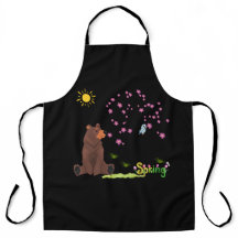 Bear observes the blooming tree and bird