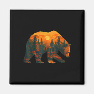 Bear silhouette with forest landscape and sunset  magnet