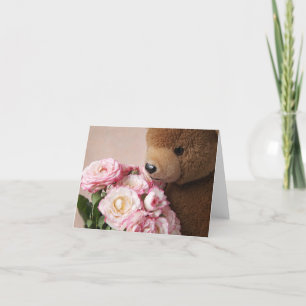 bear smelling roses note card