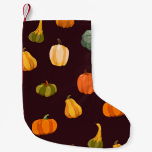 Beautiful autumn background with colourful pumpkin small christmas stocking