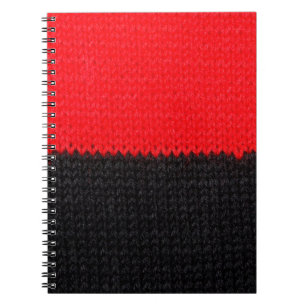 beautiful black and red knitted fabric with drawin notebook