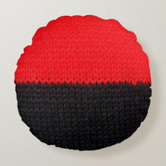 beautiful black and red knitted fabric with drawin round cushion