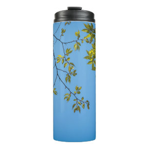 beautiful branch with green and yellow leaves hug thermal tumbler